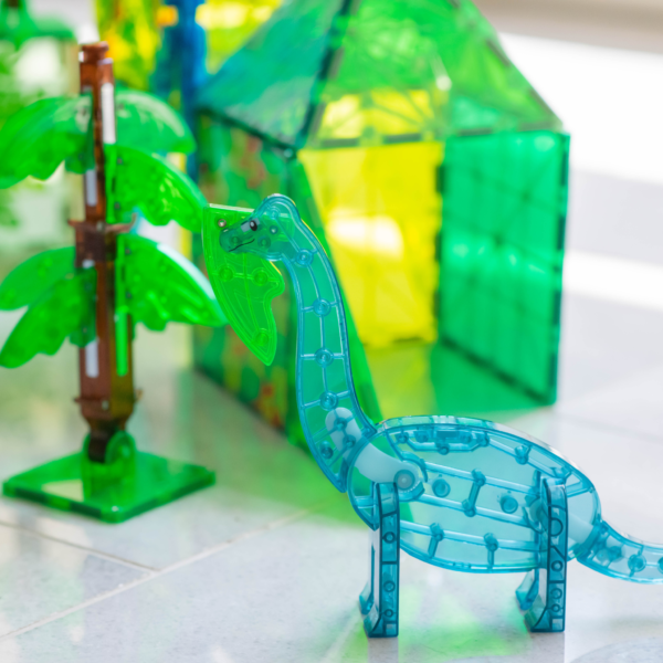 Blue Brachiosaurus with magnetic leaf attached to it's mouth from MAGNA-TILES® Dino World XL 50-Piece Set
