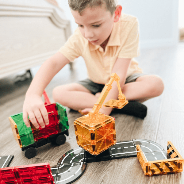 Child playing with Builder Set