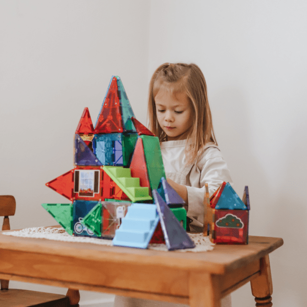 Child playing with MAGNA-TILES House Set