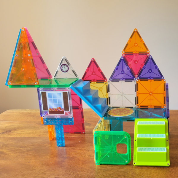 Child playing with MAGNA-TILES House Set